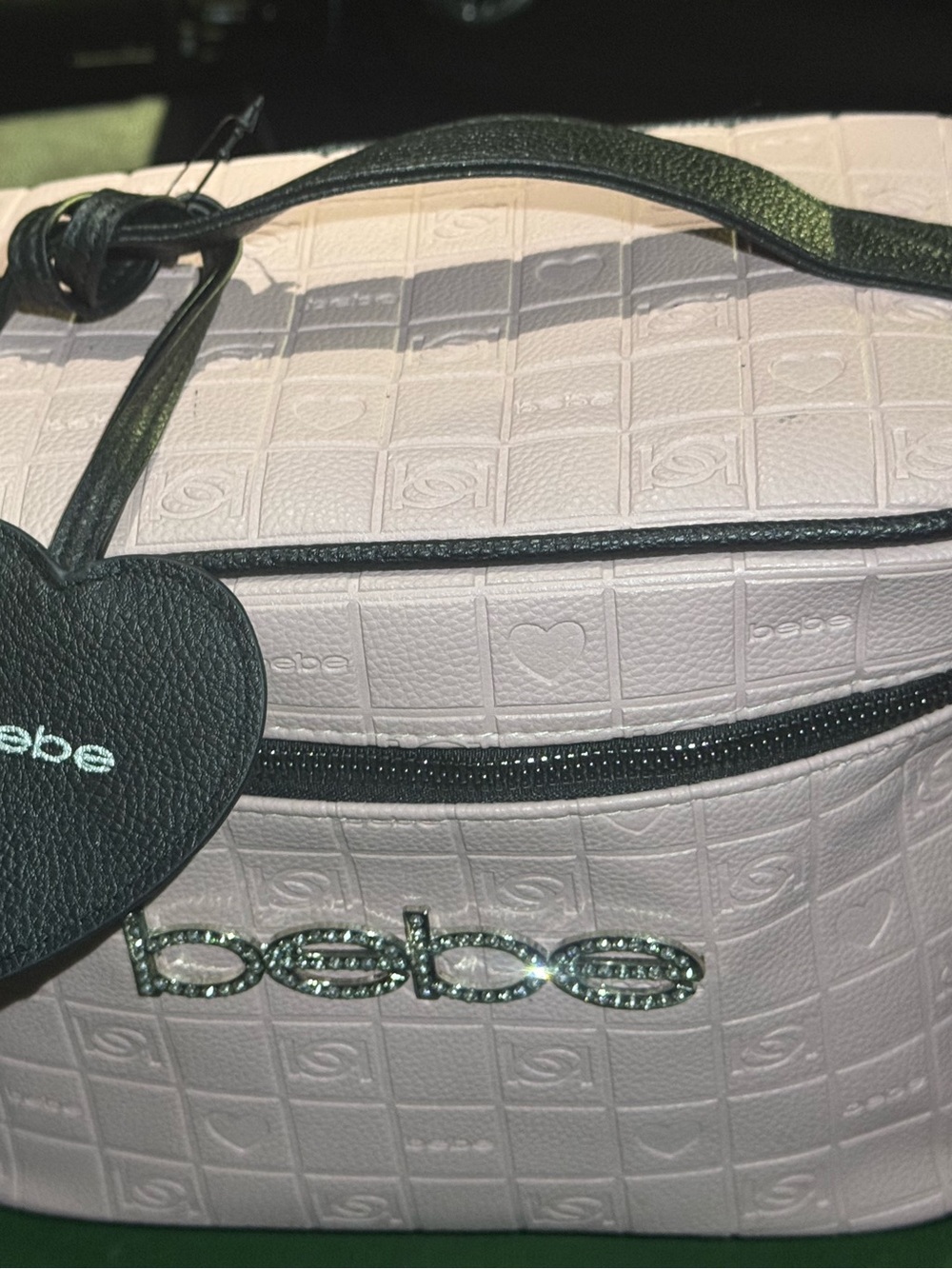 Bebe pink faux leather makeup train case